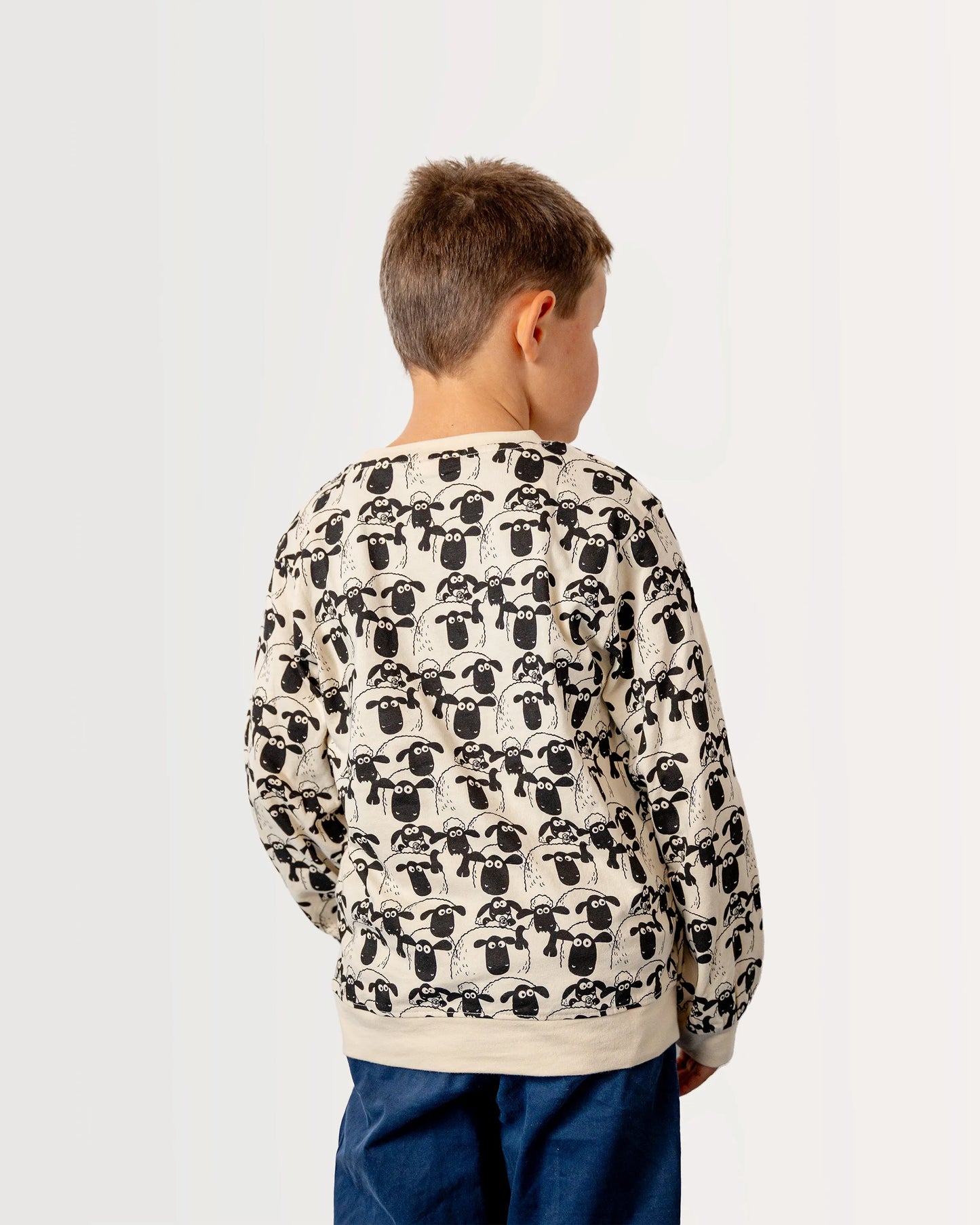 koaa – Shaun das Schaf “Schafherde” – Longsleeve beige